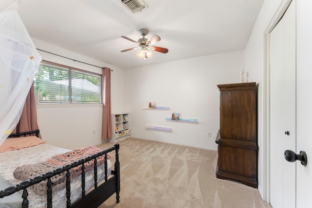 25607 Spring Ridge Dr, Spring, TX 77386 - bedroom featuring light carpet and a ceiling fan