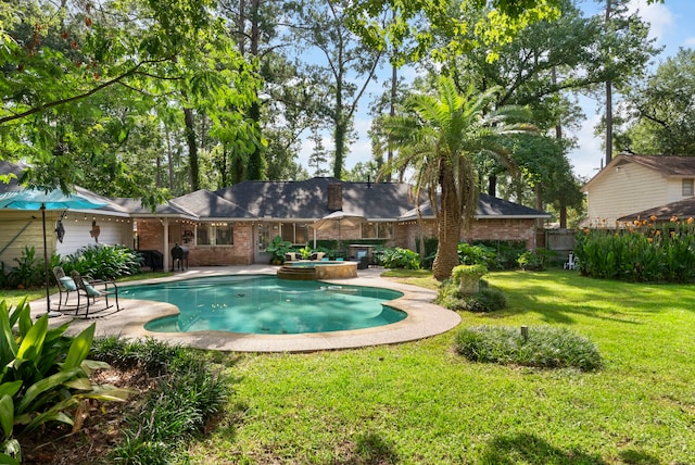 25607 Spring Ridge Dr, Spring, TX 77386 - view of swimming pool with a patio and a pool with connected hot tub
