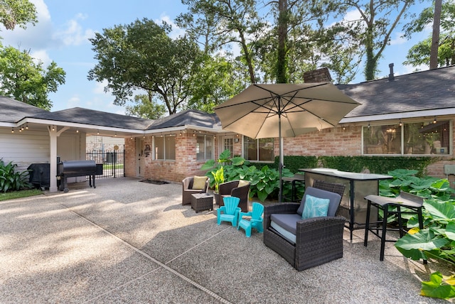 25607 Spring Ridge Dr, Spring, TX 77386 - view of patio / terrace featuring a grill
