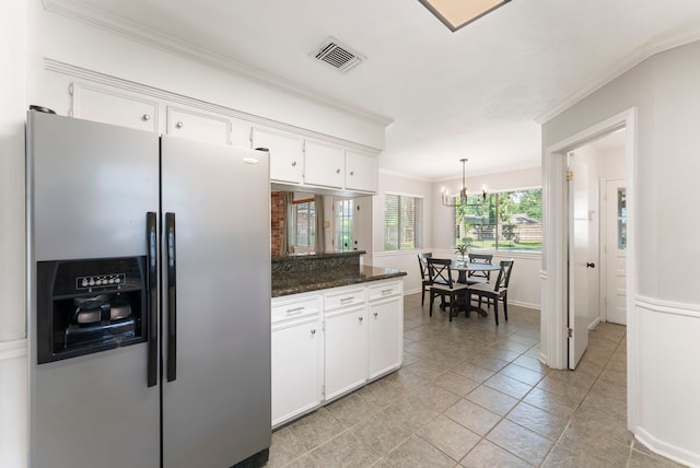 25607 Spring Ridge Dr, Spring, TX 77386 - kitchen featuring stainless steel refrigerator with ice dispenser, crown molding, white cabinets, a chandelier, and light tile patterned flooring