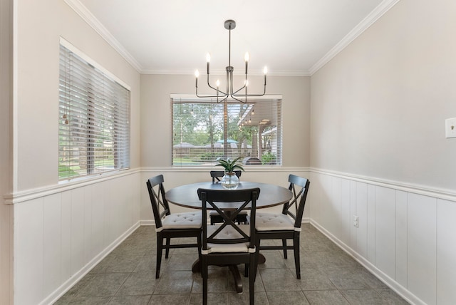 25607 Spring Ridge Dr, Spring, TX 77386 - dining area with healthy amount of natural light, a chandelier, tile patterned floors, wainscoting, and crown molding