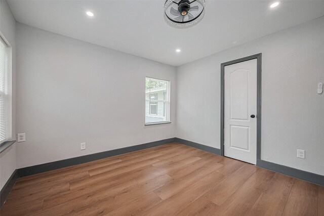 6058 Lyndhurst Dr, Houston, TX 77033 - spare room featuring light wood-style flooring, recessed lighting, and a ceiling fan