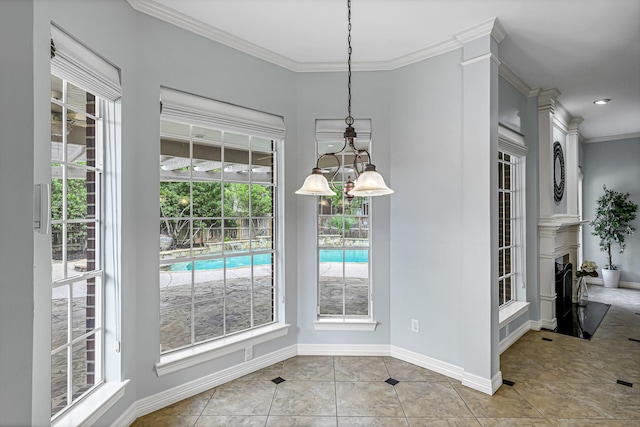 4602 Gladesdale Park Ln, Katy, TX 77450 - unfurnished dining area with healthy amount of natural light, ornamental molding, and light tile patterned floors