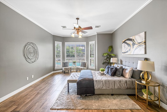 4602 Gladesdale Park Ln, Katy, TX 77450 - bedroom with crown molding, wood finished floors, and ceiling fan