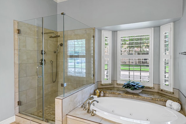 4602 Gladesdale Park Ln, Katy, TX 77450 - bathroom with a shower stall and a jetted tub