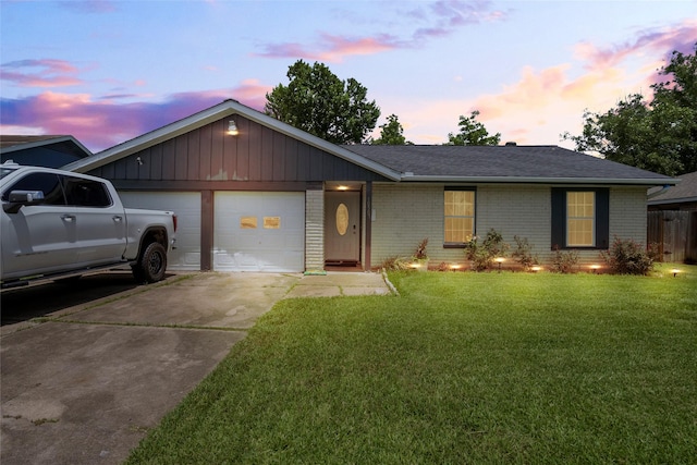 10507 Kirkhill Dr, Houston, TX 77089 - single story home with an attached garage, driveway, brick siding, a lawn, and roof with shingles