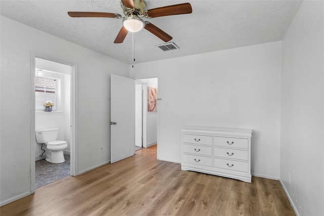 10507 Kirkhill Dr, Houston, TX 77089 - unfurnished bedroom with light wood-type flooring, ensuite bathroom, and a ceiling fan