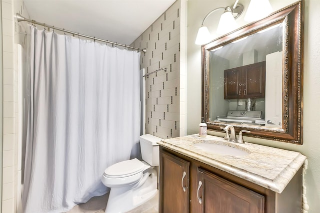 1311 Antoine Dr Unit 110, Houston, TX 77055 - full bath with vanity and washer / dryer