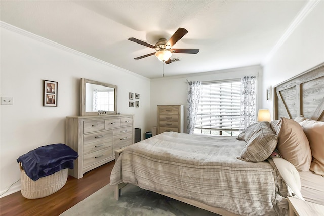 1311 Antoine Dr Unit 110, Houston, TX 77055 - bedroom featuring crown molding, dark wood finished floors, and a ceiling fan