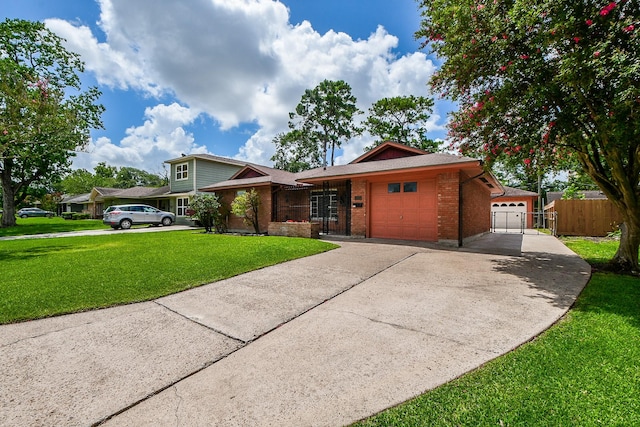 1215 W 31st St, Houston, TX 77018 - view of front of house featuring brick siding, an attached garage, and concrete driveway