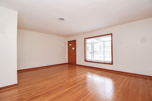 1215 W 31st St, Houston, TX 77018 - empty room featuring light wood-style flooring