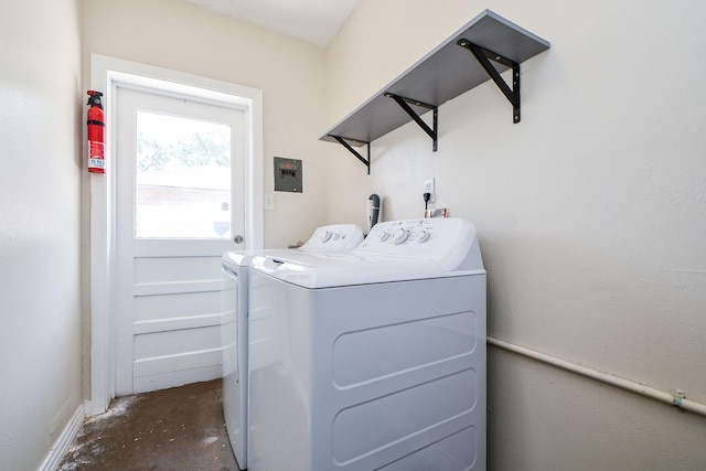 1215 W 31st St, Houston, TX 77018 - laundry area with washing machine and clothes dryer and baseboards