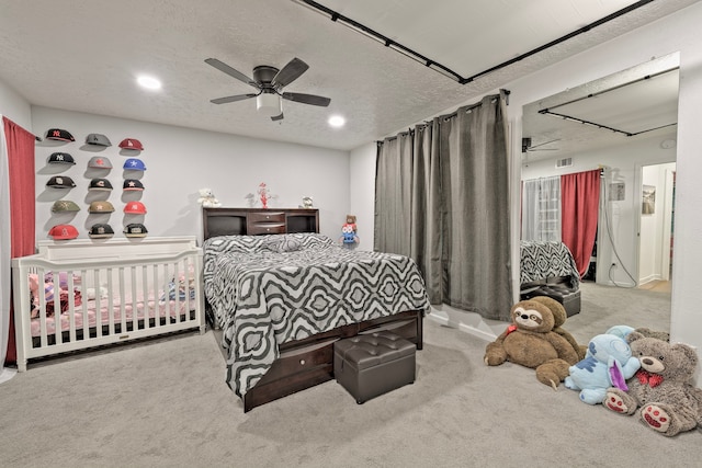 826 Rosewick St, Houston, TX 77015 - carpeted bedroom with ceiling fan and recessed lighting