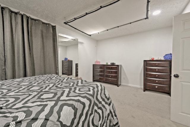 826 Rosewick St, Houston, TX 77015 - bedroom with carpet floors, a textured ceiling, and recessed lighting