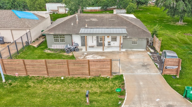 826 Rosewick St, Houston, TX 77015 - rear view of house featuring a fenced front yard, driveway, a gate, a patio area, and a shingled roof