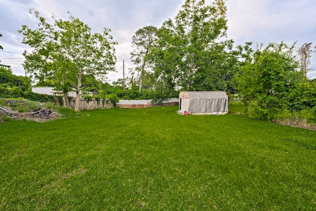 826 Rosewick St, Houston, TX 77015 - view of yard featuring a storage shed