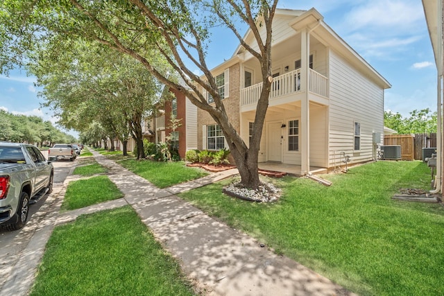 6310 Mountain Pines Ln, Katy, TX 77449 - view of front of home featuring a balcony