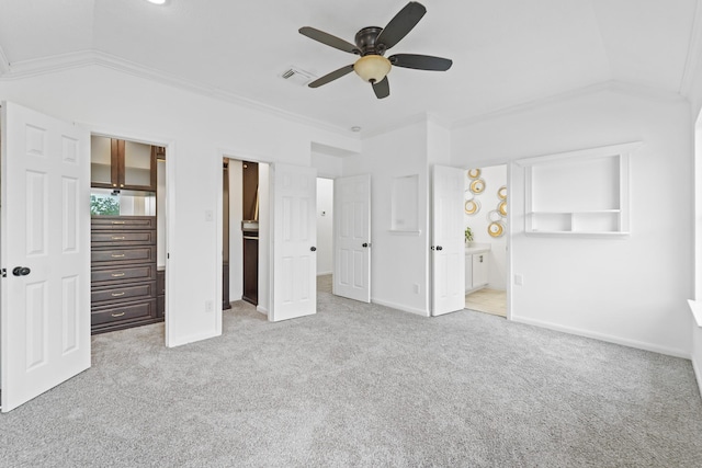 6310 Mountain Pines Ln, Katy, TX 77449 - unfurnished bedroom with ornamental molding, carpet floors, ensuite bathroom, a spacious closet, and a ceiling fan