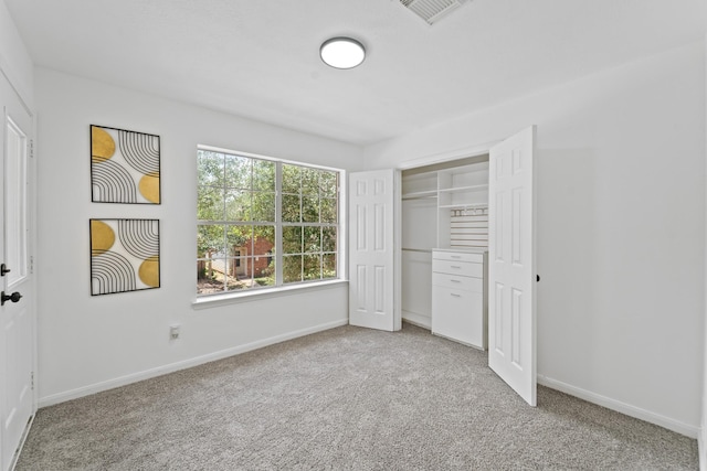 6310 Mountain Pines Ln, Katy, TX 77449 - unfurnished bedroom with light carpet and a closet