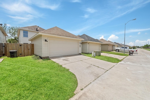 6310 Mountain Pines Ln, Katy, TX 77449 - view of front of home with a garage and driveway