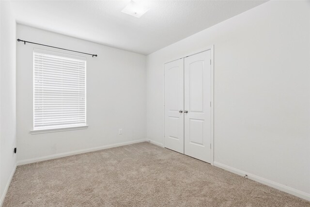6615 Lost Pines Bnd, Houston, TX 77049 - unfurnished bedroom featuring carpet floors and a closet