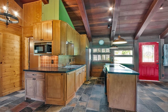 11124 Quinlan N Lake Dr, Conroe, TX 77303 - kitchen with a wooden ceiling with exposed beams, a kitchen island, stone tile floors, freestanding refrigerator, and dark countertops