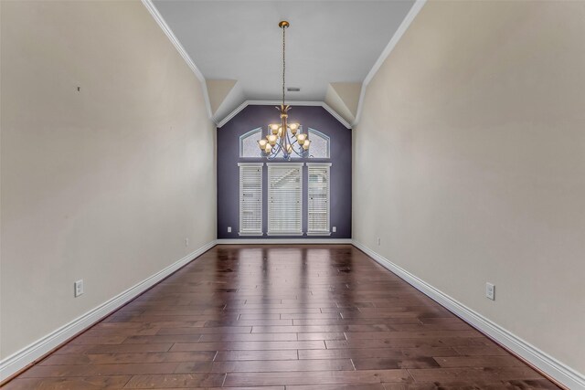 2206 Chelsea Creek Ln, Spring, TX 77386 - unfurnished dining area with a chandelier, ornamental molding, dark wood-style flooring, and lofted ceiling