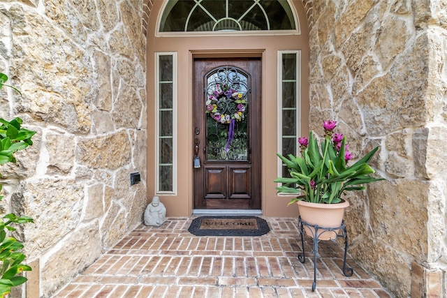 2206 Chelsea Creek Ln, Spring, TX 77386 - view of exterior entry with stone siding and stucco siding