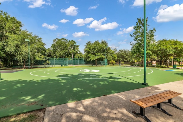 2206 Chelsea Creek Ln, Spring, TX 77386 - view of sport court featuring community basketball court and view of wooded area