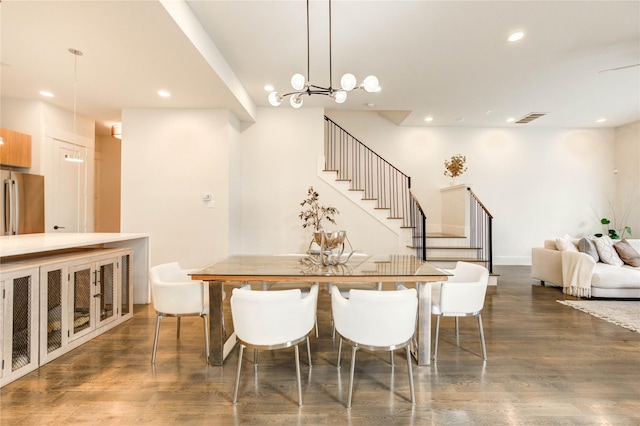 1919 Rosewood St, Houston, TX 77004 - dining room featuring stairs, recessed lighting, wood finished floors, and a chandelier