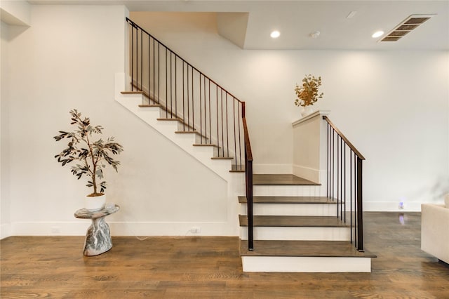 1919 Rosewood St, Houston, TX 77004 - staircase featuring wood finished floors and recessed lighting