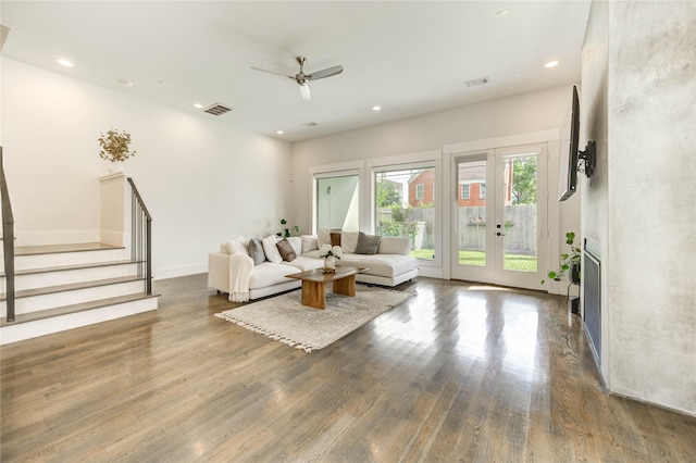 1919 Rosewood St, Houston, TX 77004 - living area with stairway, wood finished floors, a ceiling fan, recessed lighting, and french doors