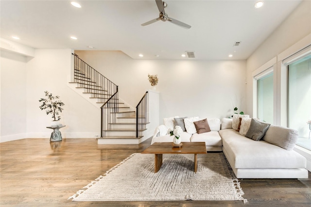 1919 Rosewood St, Houston, TX 77004 - living area with wood finished floors, recessed lighting, stairs, and a ceiling fan