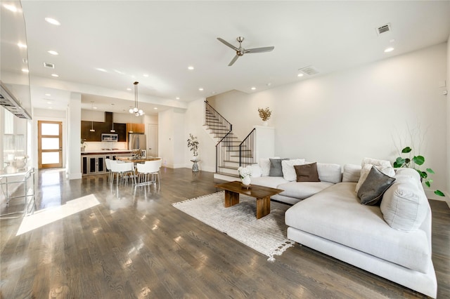 1919 Rosewood St, Houston, TX 77004 - living room featuring stairway, dark wood-style floors, a ceiling fan, and recessed lighting