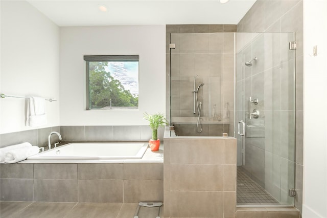 1919 Rosewood St, Houston, TX 77004 - bathroom with a shower stall, a bath, tile patterned floors, and recessed lighting