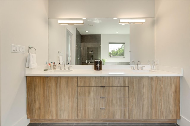 1919 Rosewood St, Houston, TX 77004 - bathroom featuring a shower stall and double vanity