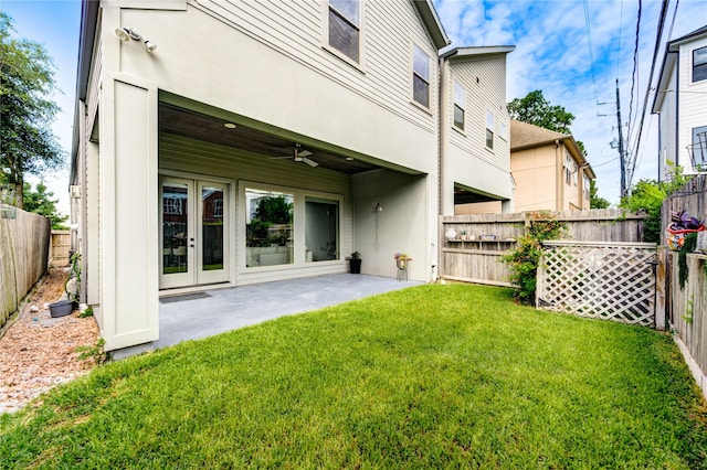 1919 Rosewood St, Houston, TX 77004 - back of house with a fenced backyard, stucco siding, a ceiling fan, a patio area, and french doors