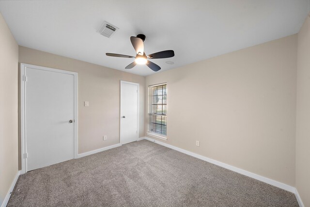 21627 Cimarron Pkwy, Katy, TX 77450 - unfurnished bedroom featuring carpet and ceiling fan