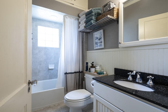 618 Wendel St, Houston, TX 77009 - full bathroom with vanity, a wainscoted wall, shower / bath combo, and tile patterned floors