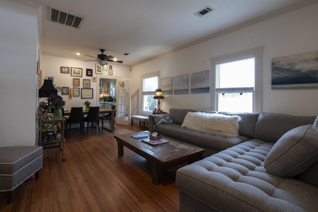 618 Wendel St, Houston, TX 77009 - living area featuring ceiling fan, wood finished floors, and ornamental molding