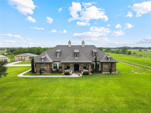 2750 Fm 563, Anahuac, TX 77514 - rear view of property with a chimney, a porch, stone siding, and roof with shingles