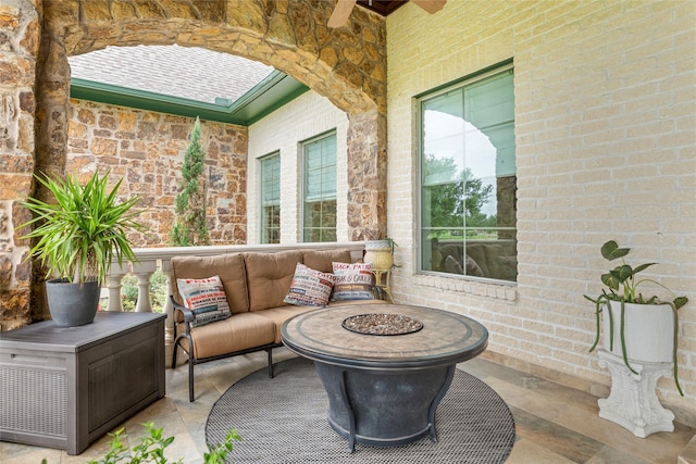 2750 Fm 563, Anahuac, TX 77514 - view of patio featuring an outdoor living space with a fire pit and a ceiling fan