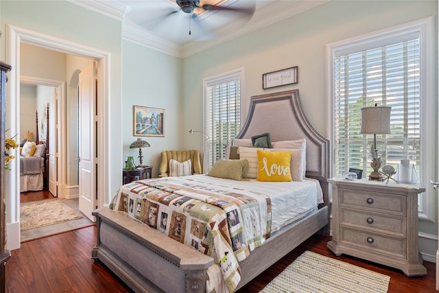 2750 Fm 563, Anahuac, TX 77514 - bedroom featuring ornamental molding, dark wood finished floors, arched walkways, and ceiling fan