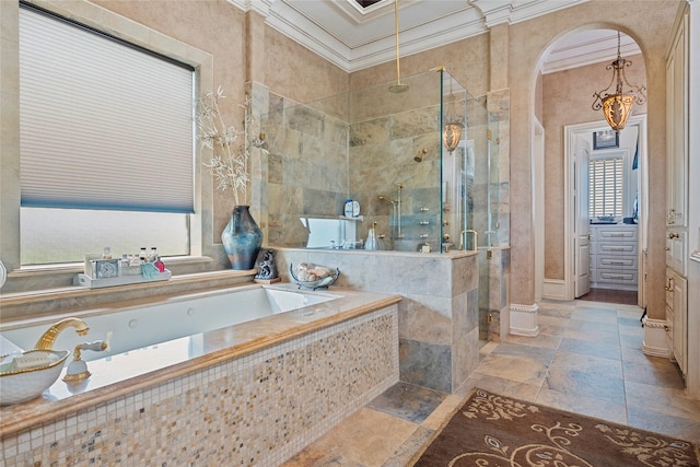 2750 Fm 563, Anahuac, TX 77514 - full bathroom featuring crown molding, plenty of natural light, a shower stall, a garden tub, and stone tile floors