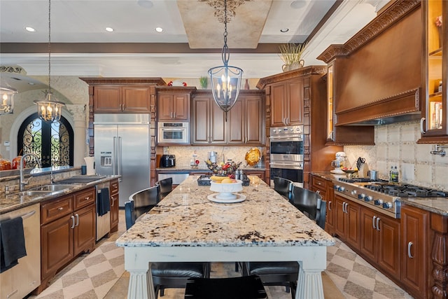 2750 Fm 563, Anahuac, TX 77514 - kitchen featuring a chandelier, stainless steel appliances, light flooring, a center island, and recessed lighting