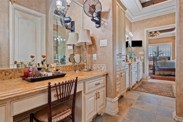 2750 Fm 563, Anahuac, TX 77514 - full bath with stone tile flooring, vanity, crown molding, and connected bathroom