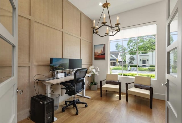 7526 Janak Dr, Houston, TX 77055 - office with a chandelier, plenty of natural light, and light wood-style flooring
