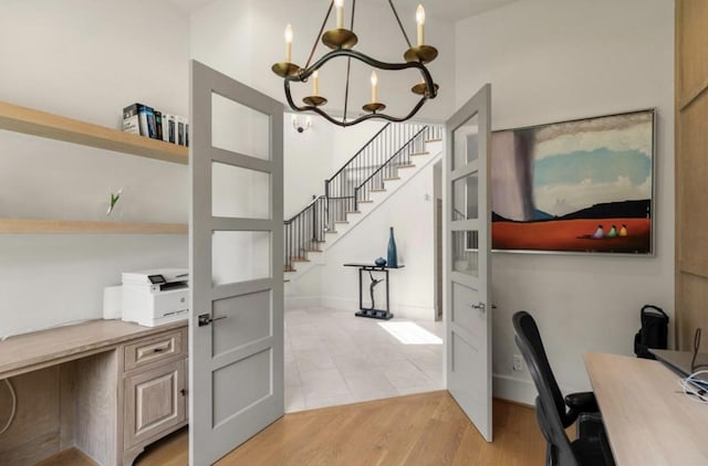 7526 Janak Dr, Houston, TX 77055 - office space with a chandelier and light wood-style flooring