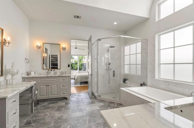 7526 Janak Dr, Houston, TX 77055 - full bath featuring a shower stall, a bath, vanity, and recessed lighting