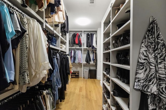 7526 Janak Dr, Houston, TX 77055 - spacious closet featuring wood finished floors